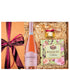Coș Rosé Reverie cu vin Malbec Rosé, miere salcâm bio, baton miere spiralat și ceai Basilur în cutie cadou elegantă